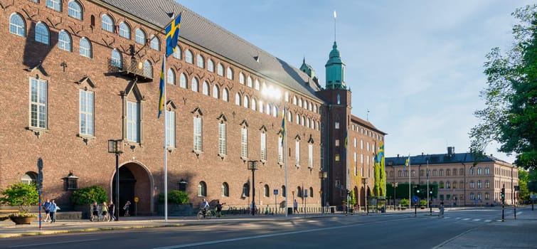 Stockholm, Sweden - June 25 2022: Facade of Stockholm City Hall, or Stadshuset, located on Kungsholmen island, next to Riddarfjarden's northern shore