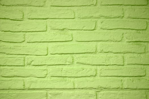 Stone texture background. Closeup of a green brick wall texture. Abstract brick stones pattern background concept, retro layout, interior design and wall banner.