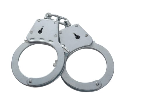 Metal handcuffs on a white isolated background, copy space. High quality photo