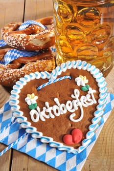 original Bavarian gingerbread heart with Oktoberfest beer mug and laugenbrezen
