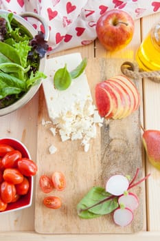 Ingredients for fresh salad with apple and feta