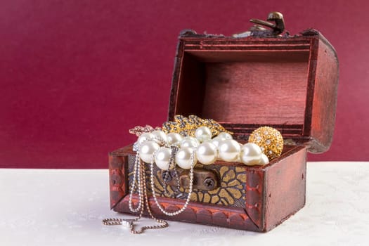 Jewelry Concept - Concept or Metaphor for selling old pearls and gold jewelry for cash.