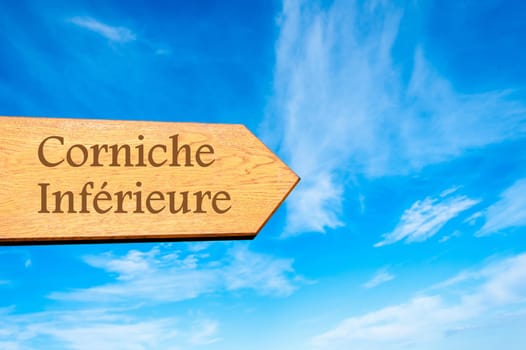 Wooden arrow sign pointing destination Versailles, FRANCE against clear blue sky with copy space available. Travel destination conceptual image