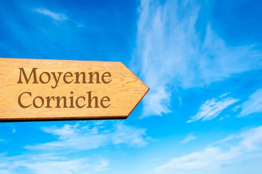 Wooden arrow sign pointing destination Versailles, FRANCE against clear blue sky with copy space available. Travel destination conceptual image