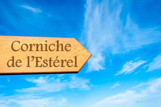 Wooden arrow sign pointing destination Versailles, FRANCE against clear blue sky with copy space available. Travel destination conceptual image