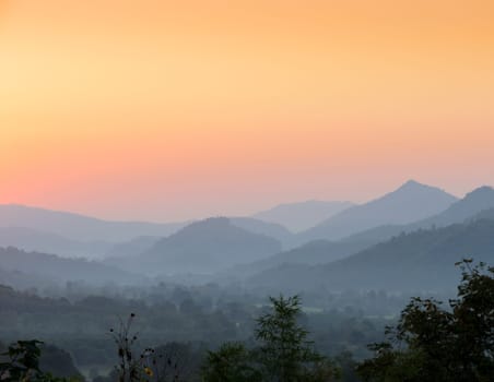 Stunning view of sunset over mountains in Thailand