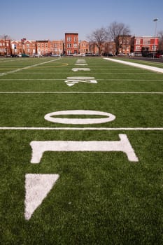 The 10 yard line on an inner city gaming field