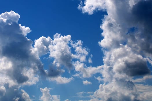 An approaching storm. Beautiful storm clouds on the blue sky..