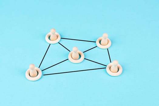 Goup of people connecting through a web, business networking, communication and teamwork