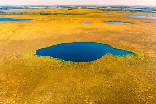 Miory District, Vitebsk Region, Belarus. The Yelnya Swamp. Upland And Transitional Bogs With Numerous Lakes. Elevated Aerial View Of Yelnya Nature Reserve Landscape. Famous Natural Landmark.