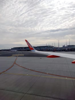 An EasyJet aircraft at Euro Airport Basel-Mulhouse is being prepared for take-off. - Theme picture - Travel photography
