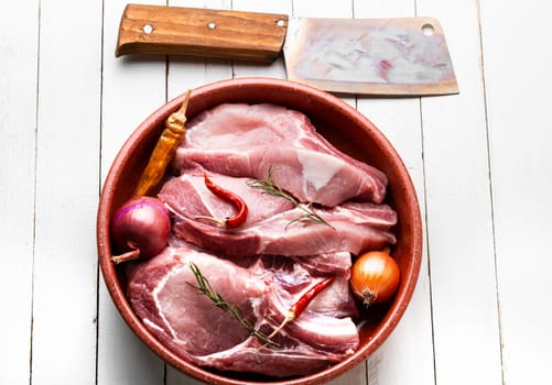 Fresh, raw pork loin on the bone.