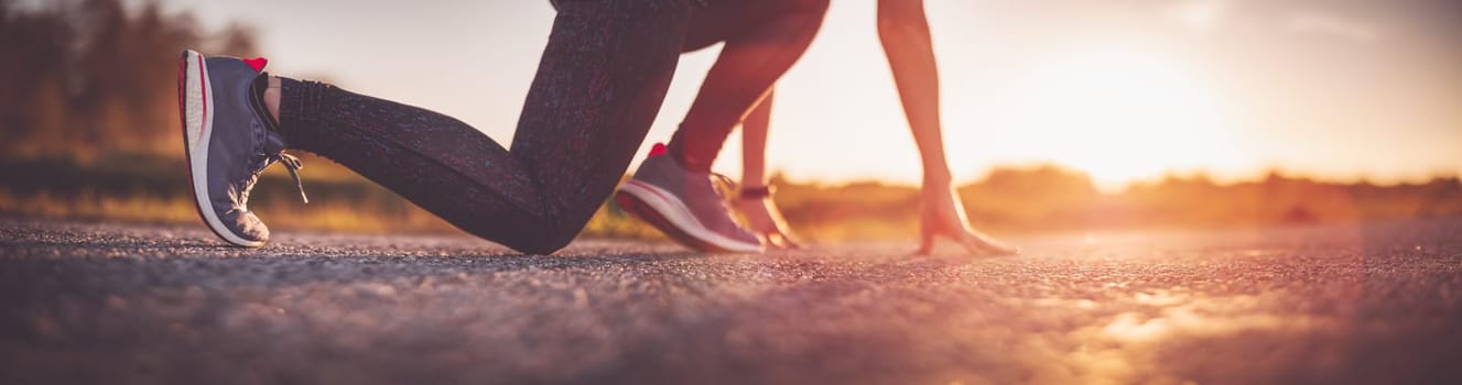 Woman starting to run outdoors in the evening.Concept of healthy lifestyle.