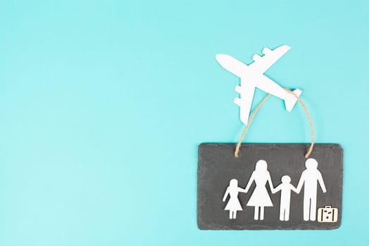 Family is going on vacation with an airplane, taking a flight for a summer holiday, greeting card, paper cut out