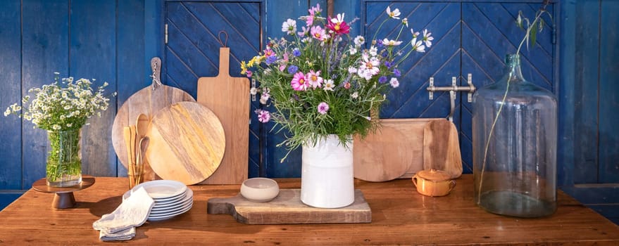 country decor vases, pots, boards and field flowers