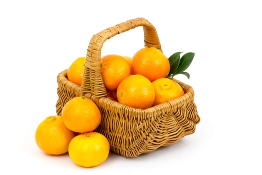 fresh tangerines in a basket on white background