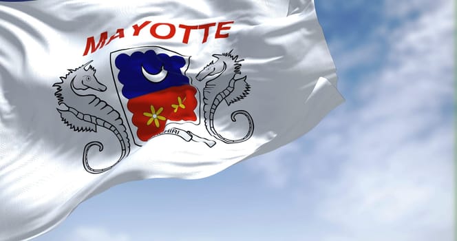 Flag of Mayotte waving in the wind on a clear day. Mayotte is an overseas department and region and single territorial collectivity of France