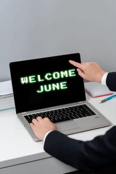 Text caption presenting Welcome June, Word for Calendar Sixth Month Second Quarter Thirty days Greetings Woman Typing Updates On Lap Top And Pointing New Ideas With One Finger.