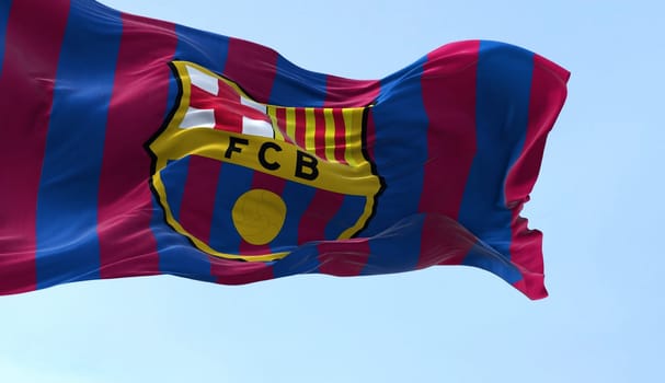 Barcelona, Spain, May 2022: The flag FC Barcelona waving in the wind on a clear day. FC Barcelona is a Spanish professional football club based in Barcelona