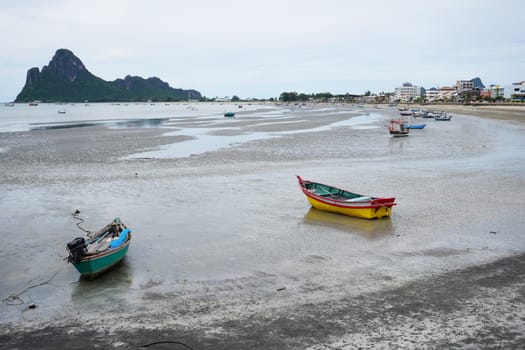 Summer beach along the coast during low tide. Prachuap Khiri Khan Province, Thailand