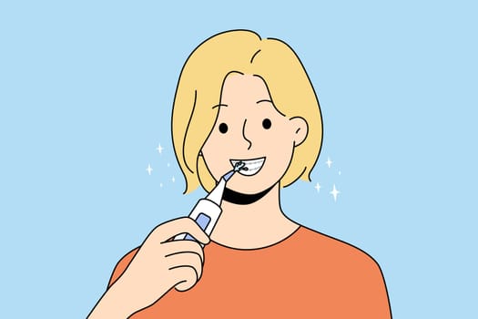 Smiling woman with braces clean teeth with dental irrigator. Happy female use brush take acre of oral hygiene. Dentistry and healthcare. Vector illustration.