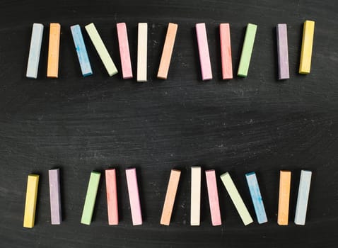 Chalkboard with colorful chalk, copy space for text , back to school, education concept