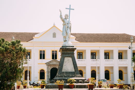 Panaji, India. Archbishop's Palace And Statue Of Jesus In Sunny Day. The residence of the archbishop.
