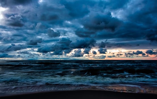Dramatic sunset over Baltic Sea in Lubiatowo, Pomerania, Poland