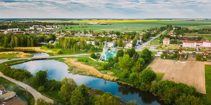 Krupets, Dobrush District, Gomel Region, Belarus. Aerial View Of Old Wooden Orthodox Church Of The Holy Trinity At Sunny Summer Day.