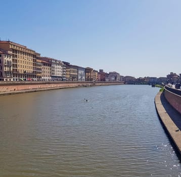 Arno river and vintage architecture of Pisa, Tuscany, Italy on 20 September 2019