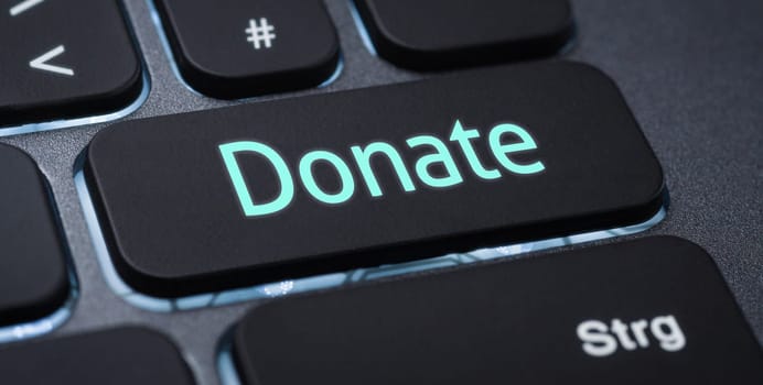 Illuminated keyboard with a labeled key - Donate
