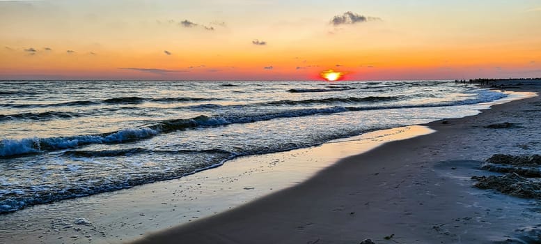 Dramatic sunset over Baltic Sea in Lubiatowo, Pomerania, Poland