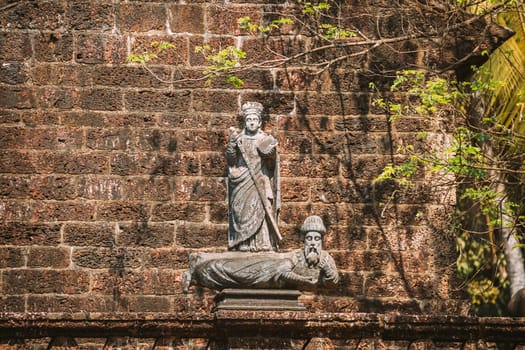 Old Goa, India. Old Viceroy’s Arch In Old Goa Was Built In The Memory Of Vasco Da Gama In 1597. Famous Gate Landmark And Historical Heritage. Close Up Details.
