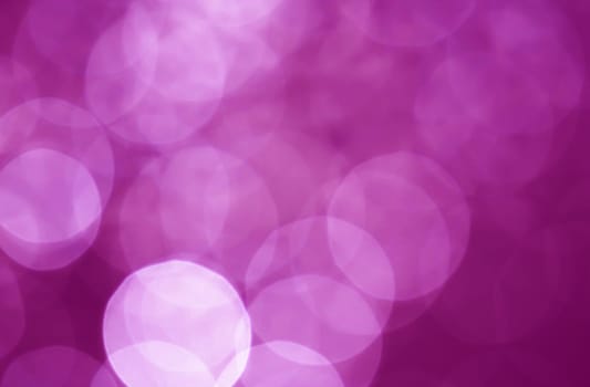 Light abstract dark bokeh christmas circle color glitter blurred black background