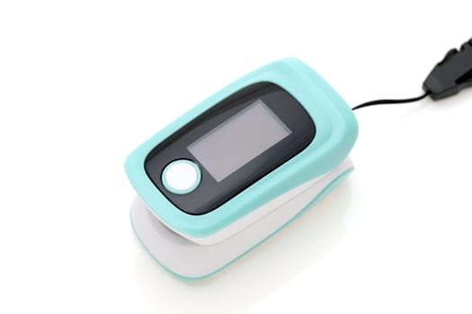 Pulse oximeter device on white background, healthcare monitoring concept