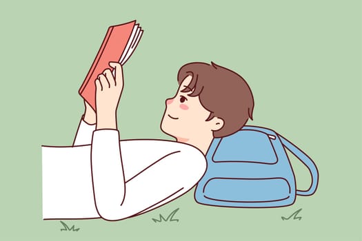 Happy guy lying on grass reading book. Smiling child enjoy literature. Knowledge and education. Vector illustration.