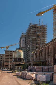 Restoration and conversion Restoration of an old factory site into apartments