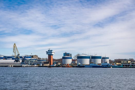 KLAIPEDA, LITHUANIA - APRIL, 18, 2022: Klaipeda International Cargo Port Terminal with tanks