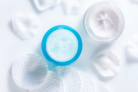 Moisturizing cosmetic day and night creams with cotton pads