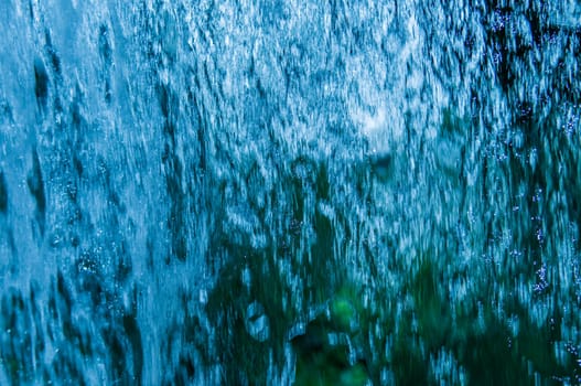 Full frame view of cascading water close-up.