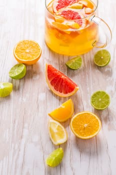 Citrus lemonade or ice tea. Drink with fresh lemons and oranges. Lemon cocktail with juice and ice