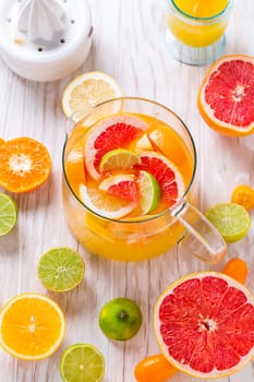 Citrus lemonade or ice tea. Drink with fresh lemons and oranges. Lemon cocktail with juice and ice