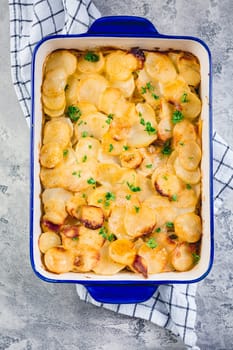 Potato casserole with onions and eggs. Vegetarian meal.