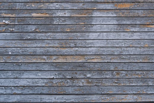 The textured wooden backdrop aged