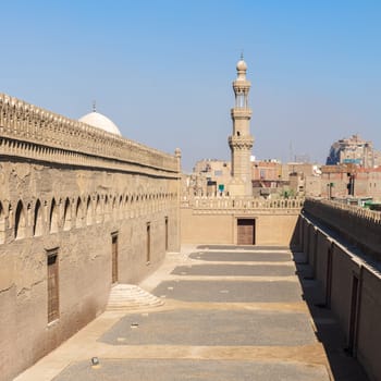 Passages surrounding Ibn Tulun mosque with the minaret of Amir Sarghatmish mosque at far distance, Sayyida Zaynab district, Medieval Cairo, Egypt