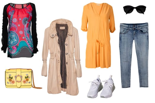 Collage woman clothes. Set of a stylish and trendy women coat, a blouse or shirt, white shoes, a handbag, a jeans and other accessories isolated on a white background. Latest fashion trends.