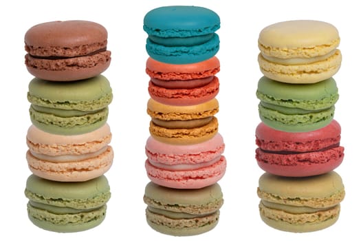 Pastries, desserts and sweets. Collage set of a various multicolored original french macaroon cookies isolated on a white background. Such as green pistachio, yellow lemon, red strawberry, brown chocolate or red raspberry macaroons.