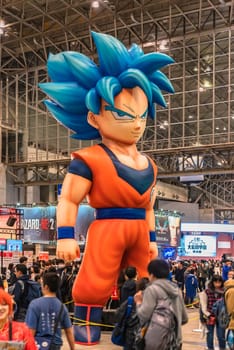 chiba, japan - december 22 2018: Huge inflatable structure of Son Goku character from the anime and manga serie of Dragon Ball standing under the ceiling of the anime convention Jump Festa