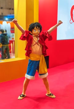 chiba, japan - december 22 2018: Cosplayer wearing costume, mask and wig of the pirate character Monkey D.Luffy of the manga and anime series of One Piece during the convention Jump Festa 19.