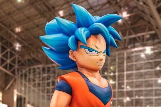 chiba, japan - december 22 2018: Huge inflatable structure of the bust of Son Goku character from the anime and manga serie of Dragon Ball floating under the ceiling of the anime convention Jump Festa